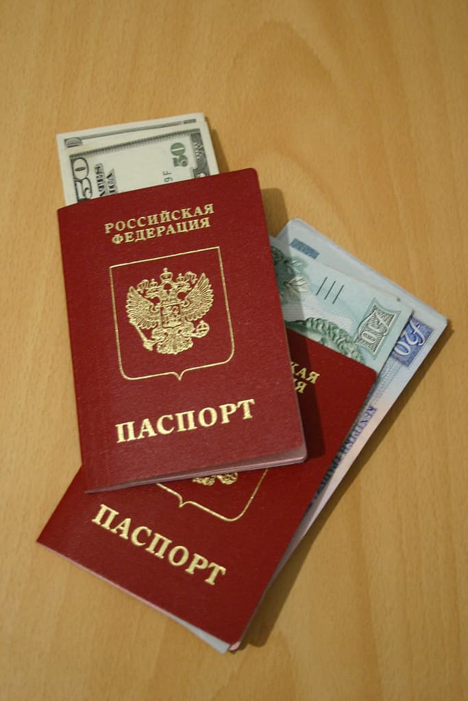 Passport and travel documents prepared for an overseas employment application